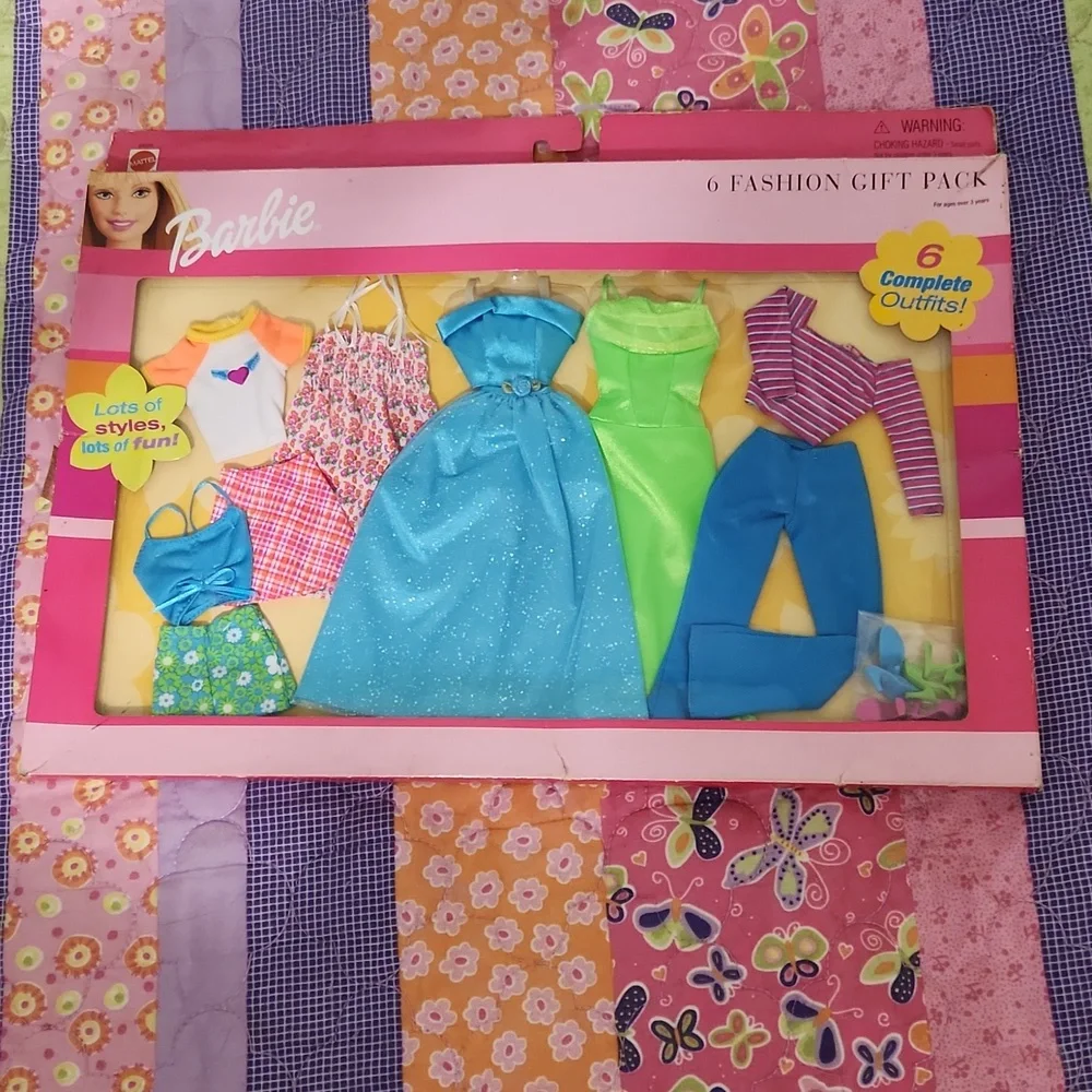 Brand New never opened Barbie fashions.